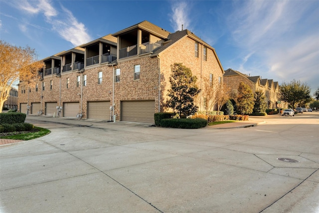 view of side of home featuring a garage