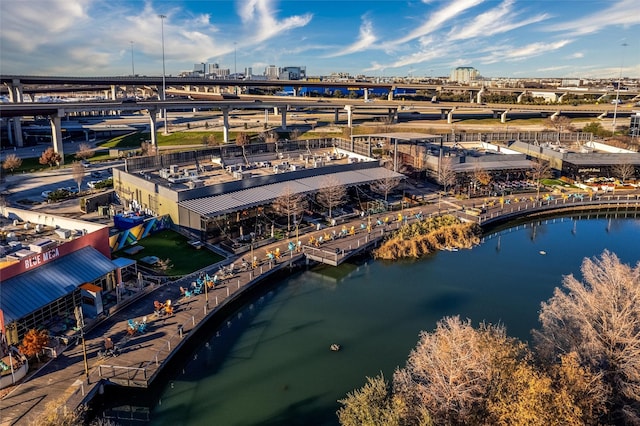 birds eye view of property with a water view