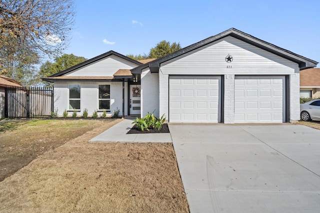 single story home with a front lawn and a garage