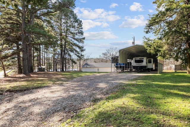 view of yard featuring a carport