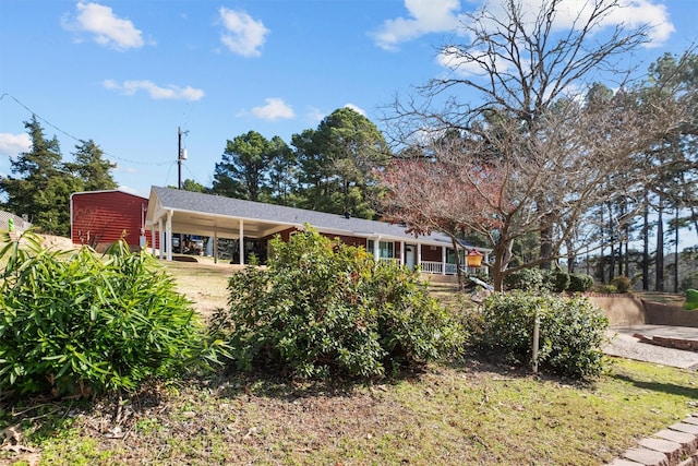 view of front of house featuring a carport