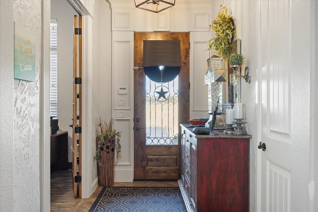 entrance foyer featuring hardwood / wood-style flooring