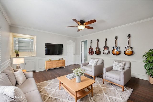 living room with ceiling fan, crown molding, and dark hardwood / wood-style floors