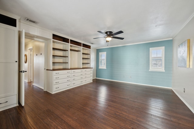 unfurnished bedroom with ceiling fan, dark hardwood / wood-style flooring, and crown molding