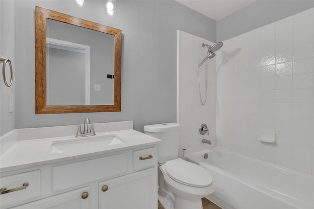 full bathroom with toilet, tiled shower / bath combo, and vanity