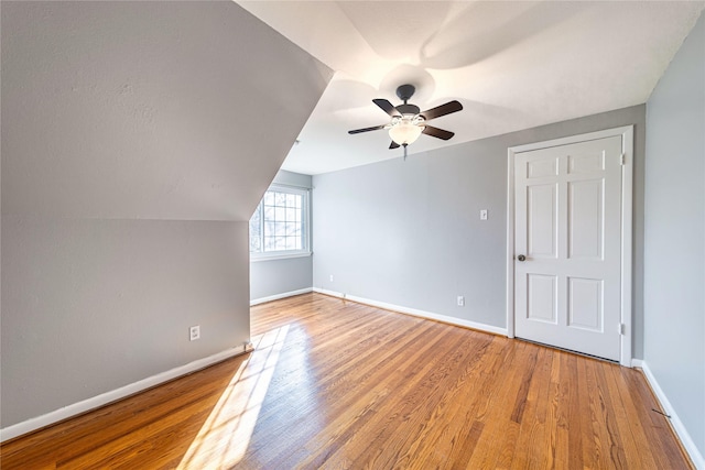 bonus room featuring vaulted ceiling, ceiling fan, and hardwood / wood-style floors