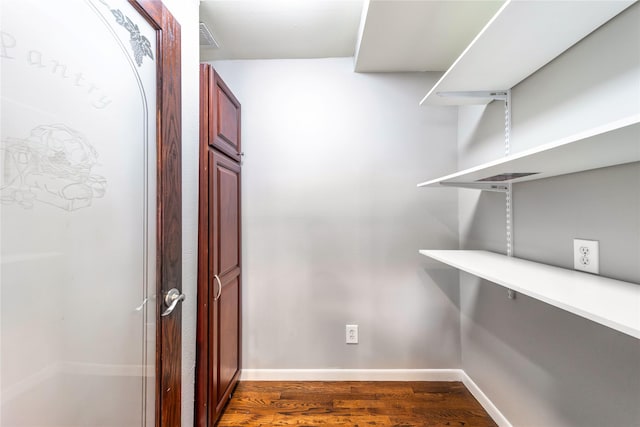 interior space with dark hardwood / wood-style floors