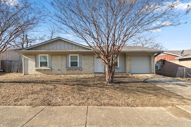 single story home featuring a garage