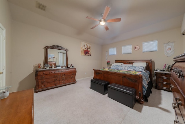 bedroom featuring light carpet and ceiling fan