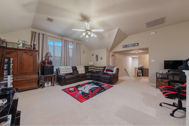 living room with ceiling fan, carpet floors, and lofted ceiling