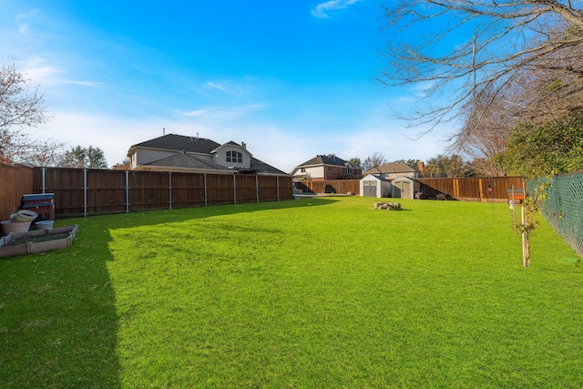 view of yard with a storage shed