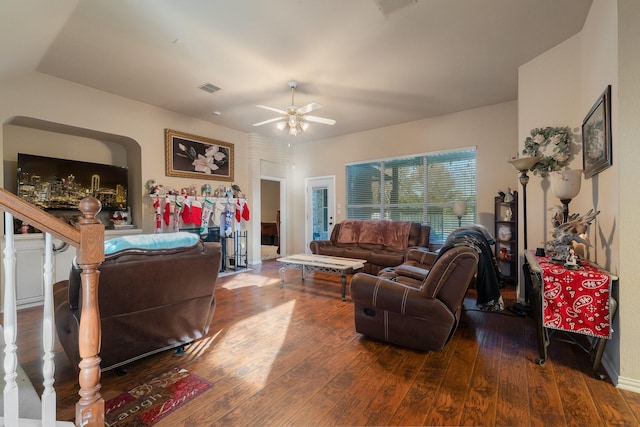 living room with ceiling fan and wood-type flooring