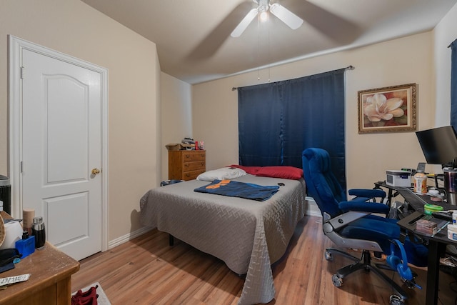 bedroom featuring ceiling fan and wood-type flooring