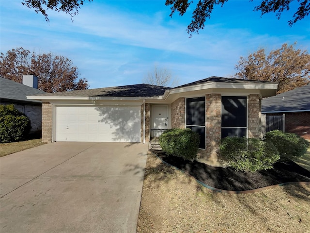 ranch-style home with a garage