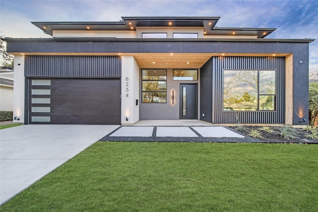 contemporary home with a front yard