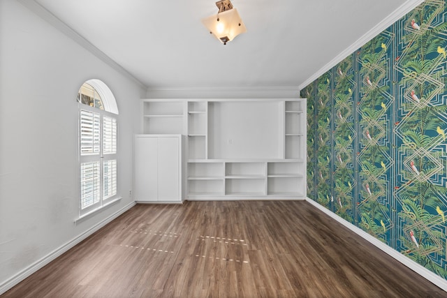 interior space featuring dark hardwood / wood-style floors and crown molding