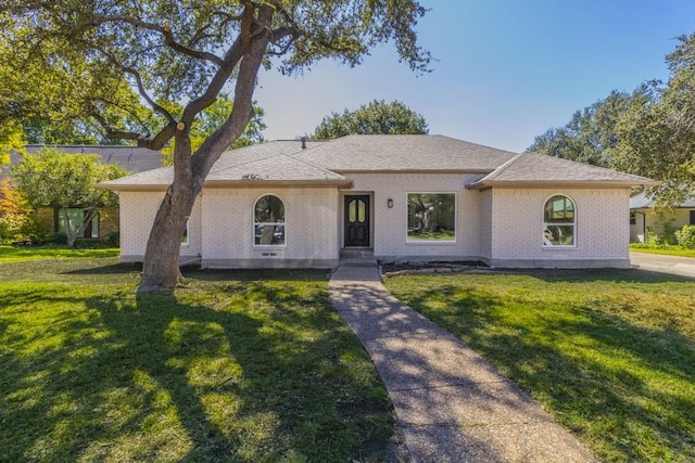 view of front of home with a front yard