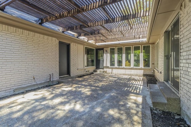 view of patio / terrace featuring a pergola