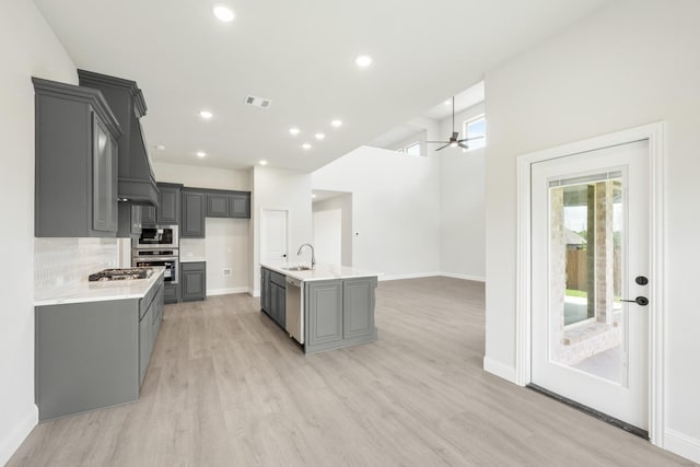 1233 Sylvia St, Desoto, TX 75115 - kitchen featuring stainless steel appliances, gray cabinets, a sink, light countertops, and recessed lighting