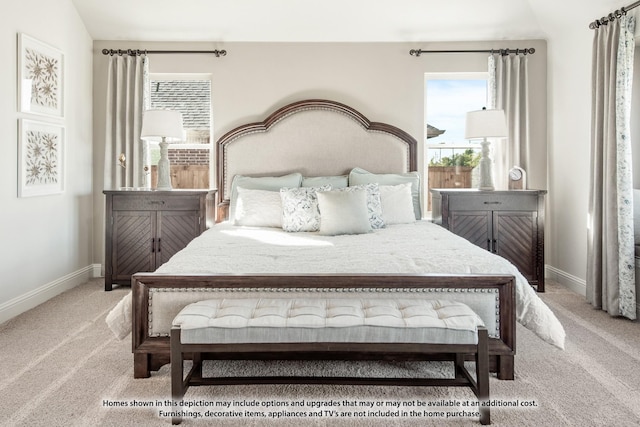 carpeted bedroom with vaulted ceiling