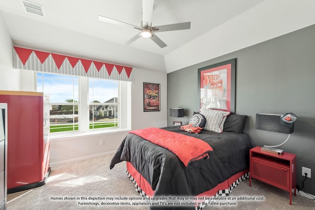 bedroom featuring ceiling fan, carpet floors, multiple windows, and lofted ceiling