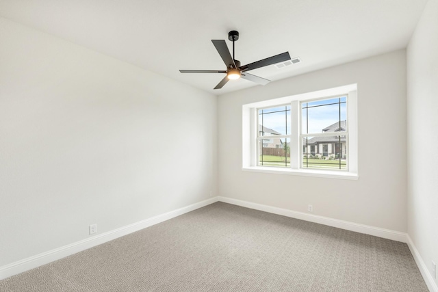 1233 Sylvia St, Desoto, TX 75115 - carpeted empty room with baseboards and ceiling fan