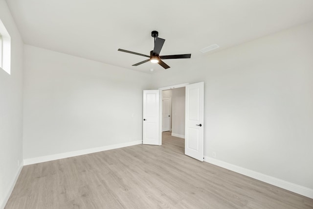 1233 Sylvia St, Desoto, TX 75115 - unfurnished room featuring a ceiling fan, light wood finished floors, and baseboards