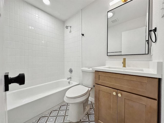 full bath with visible vents, vanity, toilet, and bathing tub / shower combination