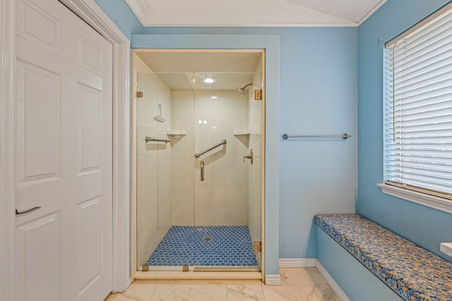 bathroom with a shower with shower door