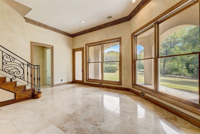 foyer entrance featuring a high ceiling