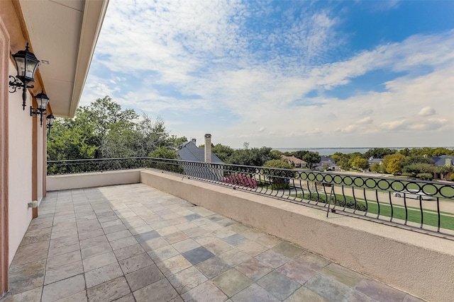 view of patio with a balcony