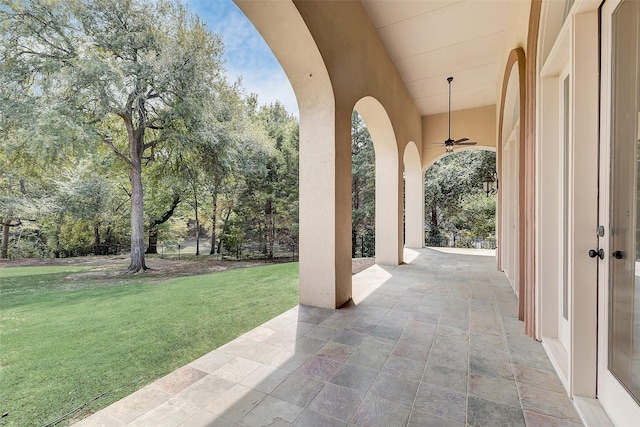 view of patio featuring ceiling fan