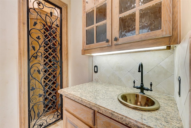 wine room featuring sink