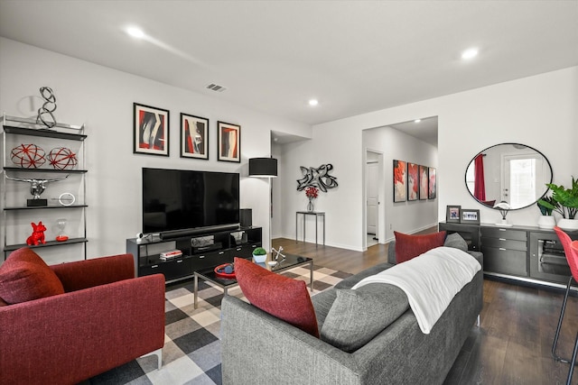 living room featuring dark hardwood / wood-style flooring