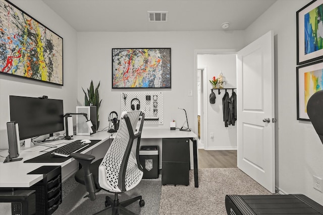 view of carpeted home office