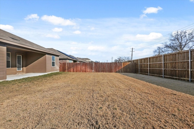 view of yard with a patio area