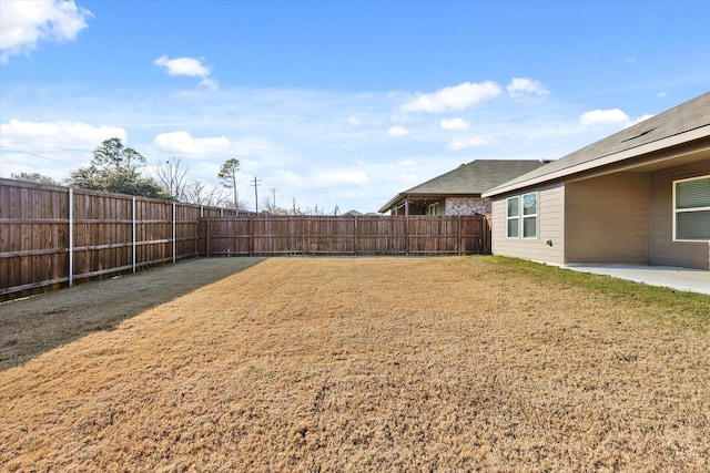 view of yard with a patio area