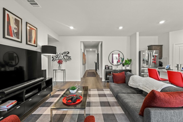 living room with dark wood-type flooring