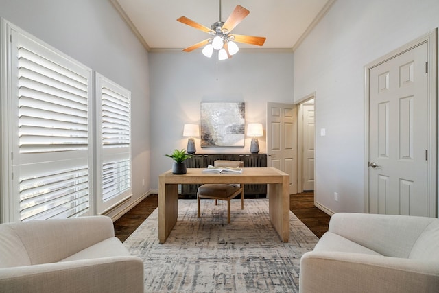 home office with ceiling fan, ornamental molding, and dark hardwood / wood-style flooring