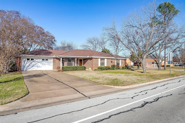 single story home with a front lawn and a garage