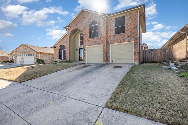 front facade featuring a front lawn and a garage