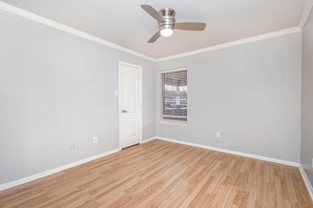 spare room featuring ceiling fan, crown molding, and light hardwood / wood-style floors