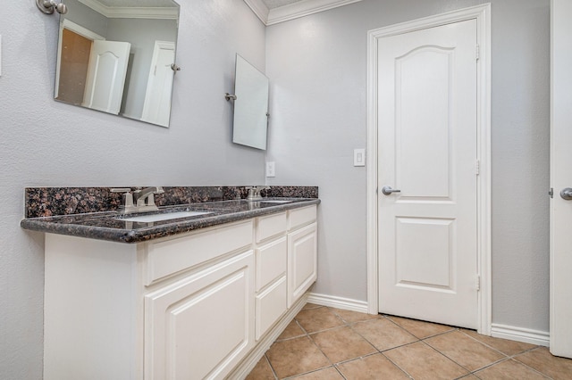 bathroom with vanity, tile patterned floors, and ornamental molding