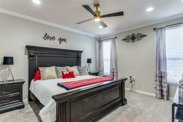 carpeted bedroom with crown molding and ceiling fan