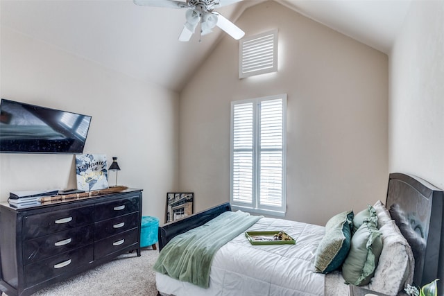 bedroom featuring ceiling fan, light colored carpet, and lofted ceiling