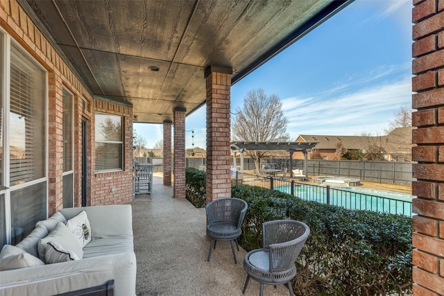 view of patio with outdoor lounge area and a pergola