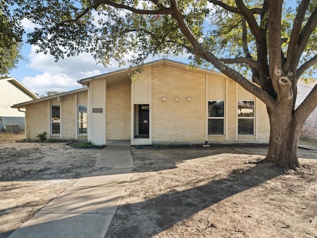 view of front of home featuring central air condition unit