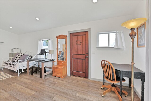 kitchen with a breakfast bar, an inviting chandelier, an island with sink, stainless steel appliances, and white cabinets