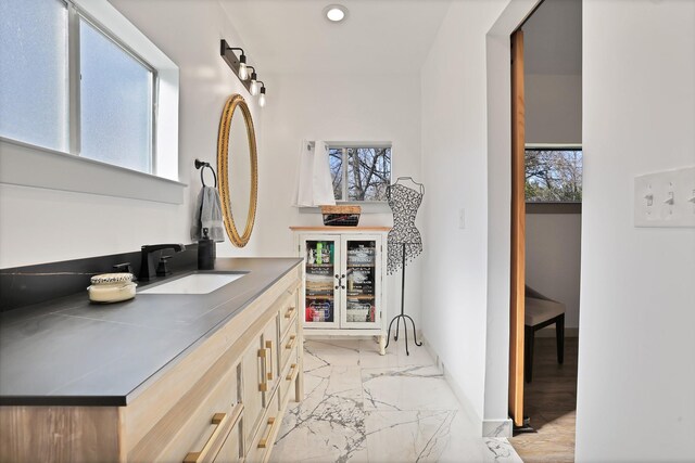 full bathroom with toilet, vanity, and shower / tub combo with curtain