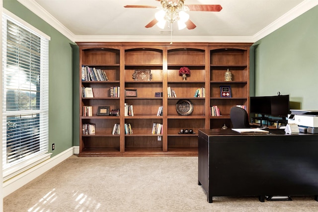 office with ceiling fan, crown molding, and light colored carpet